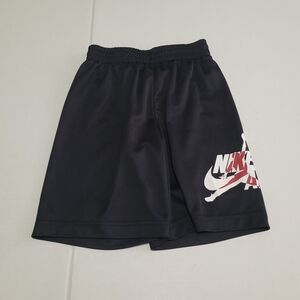 Nike Black Basketball Shorts with White and Red Logo Accent